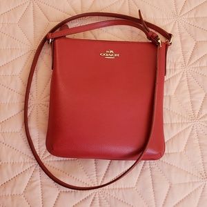 used red leather Coach purse